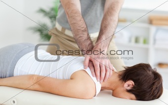 Man massaging a woman