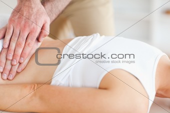 Lying Woman getting a massage