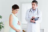Pregnant woman visiting her doctor