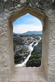 Waterfall through a fort window