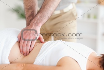 Masseur massaging a woman