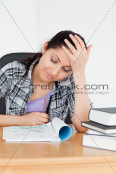 Student looking to her homework