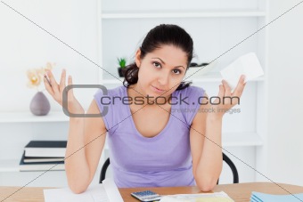 Unenthusiastic young woman accounting