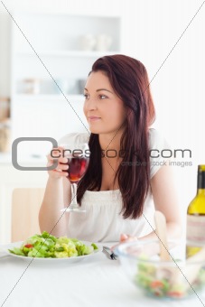 Close up of a beautiful women drinking wine