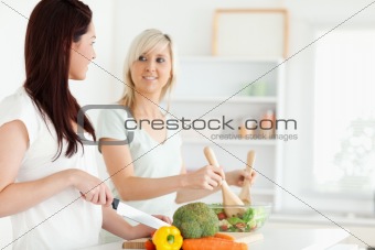 Young Women preparing dinner