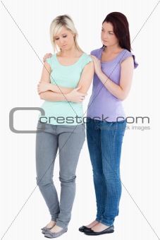 Woman comforting sad friend