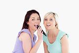 Cheerful Women singing karaoke