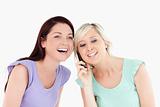 Laughing women on the phone
