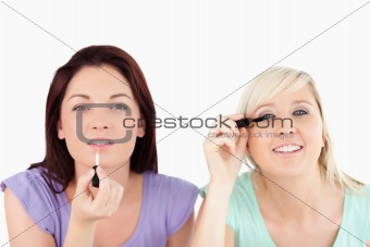Pretty Women applying make-up
