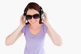 Beautiful Woman with headphones and sunglasses