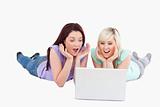 Cheerful women with a laptop