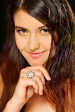 Portrait of lovely girl with ring on hand
