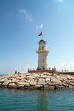 Lighthouse in port. Turkey, Alanya. Sunny weather