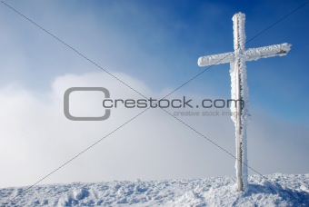 Cross on the mountain peak