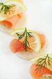 Canapes with smoked salmon and herbs