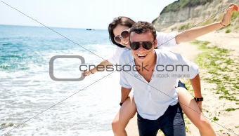 Young couple enjoing beach