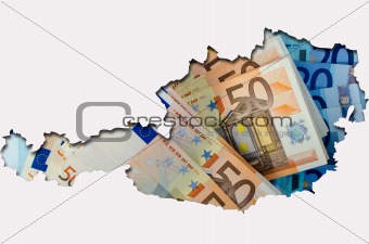 Outline map of Austria with euro banknotes in background 