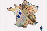 Outline map of France with euro banknotes in background 