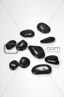 Zen-like black stones isolated on white