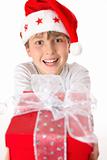 Festive child holding a present