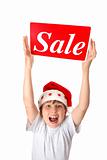 Excited boy with Sale Sign