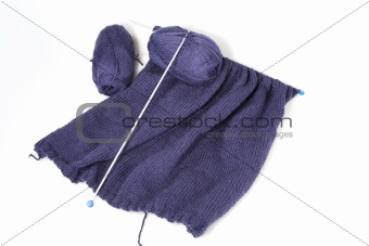 Piece of blue knitting in progress