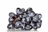 cluster of black grapes isolated on white background