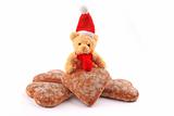 teddy bear on pile of honey-cakes