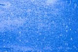 Blue abstract texture (heavy rain falling adn streaming down on 