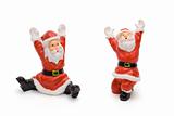 Santa Claus figurines isolated on white