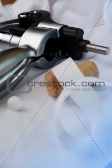 Wine bottle opener against waiter's uniform