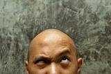 bald headed man confuse