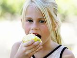 Girl eating apple