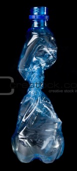 silhouette of a crumpled plastic bottles 