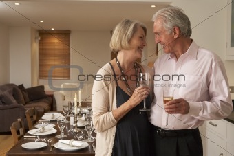 Couple Throwing A Dinner Party