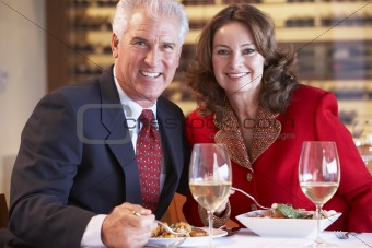 Couple Eating Dinner At A Restaurant