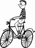 Boy riding the bicycle