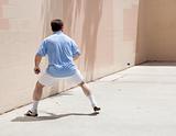 Man Plays Racquetball