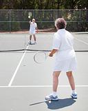 Tennis Game - Senior Couple