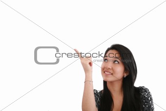 happy smiling young business woman showing blank area for sign o
