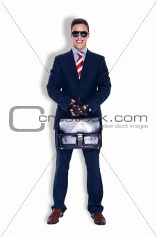 Manager in glasses holding a case