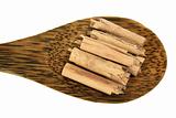 Cinnamon Sticks on Wooden Spoon
