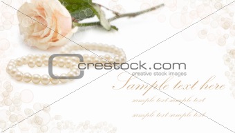 Greeting card with pearls and rose