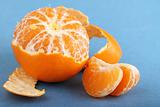 Tangerine with peeled skin