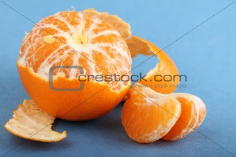 Tangerine with peeled skin