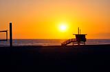Lifeguard tower with sunset