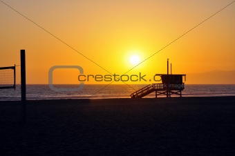 Lifeguard tower with sunset