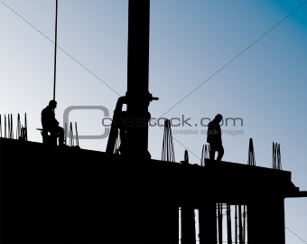 Construction site with crane and workers