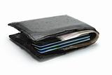 Cash and credit cards in old wallet