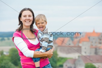 Travelers. Young mother with her son